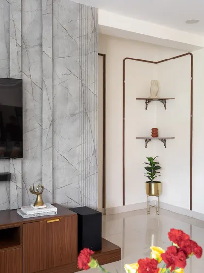 This corner detail from 'The Flux Abode' shows how I use simple, clean lines and minimal shelving to create elegant display areas.