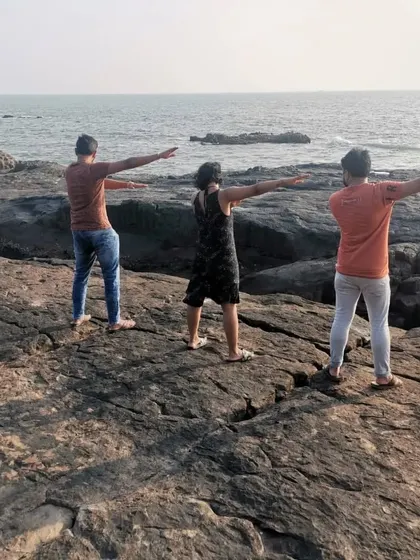 Enjoying the sea breeze and the unique basalt rock formations on St. Mary's Island near Malpe.