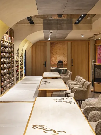 The consultation tables at Ahujasons are set within arched nooks, creating a sense of privacy and focus. The design allows for unhurried, personal interactions, transforming the act of shopping into a curated and memorable experience.