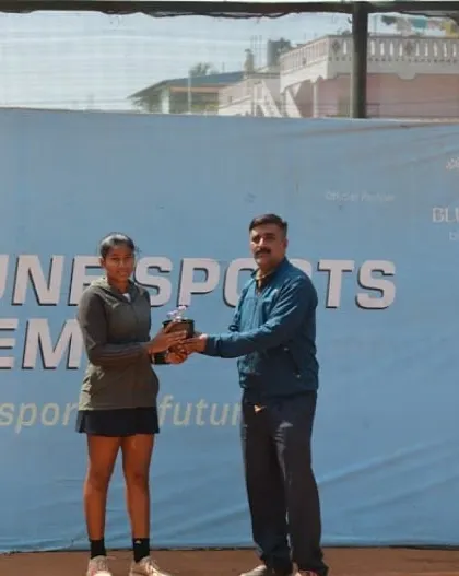 The Girls U18 winner receiving her trophy at the AITA CS 3 tournament. We conduct professional award ceremonies to honor the champions.