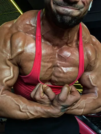 The most muscular pose, showcasing the results of a successful prep. Every muscle group is full and separated, with veins popping. This is not luck, it's science.