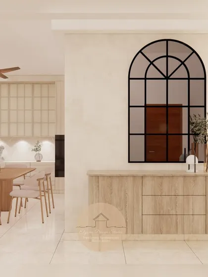 A custom light wood console sits below an arched window-pane mirror in this foyer. This piece provides storage while setting a warm and welcoming tone from the moment you enter the home.