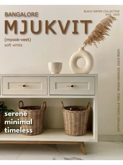 (1/3) White never looked so good. This is 'Mjukvit', a serene and timeless entryway console we designed, featuring a Duco body and brass handles.