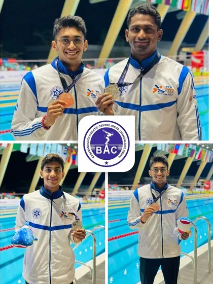 Sajan Prakash, Aneesh Gowda, and Vedanta Madhira on the podium at the Asian Age Group Championships.