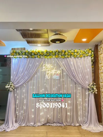 We can work with any color scheme you have in mind. This lovely setup combines soft lavender drapes with a contrasting yellow floral header for a unique look.