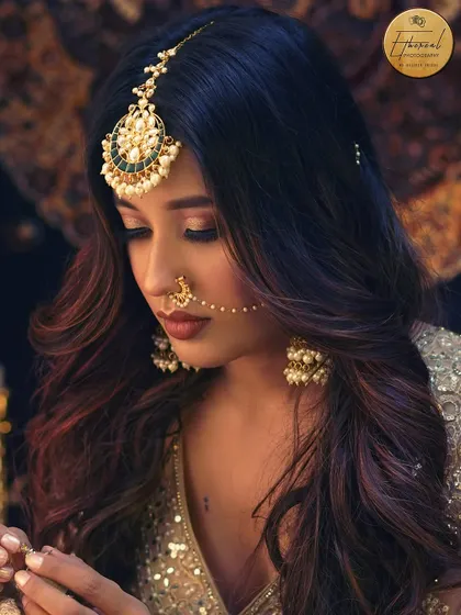 A close-up portrait from the "Heeramandi" inspired shoot, focusing on the intricate maang tikka and expressive eyes.