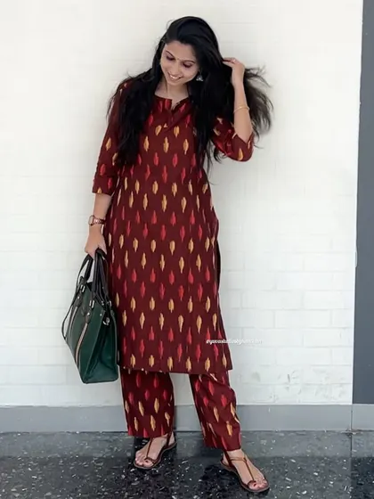 A full look at our classic straight-fit kurta and pant set in a deep maroon Ikat. This timeless design is made from pure handloom cotton and is perfect for any occasion.