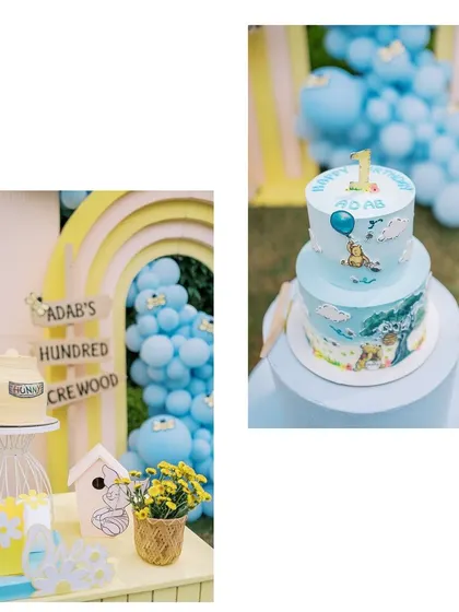 A closer look at the dessert table, featuring a 'hunny' pot cake stand and a beautiful two-tiered Winnie the Pooh cake.