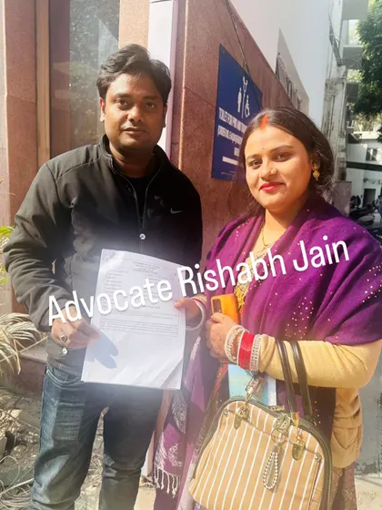 Here I am with a client after successfully completing her marriage registration in Delhi. This is a compulsory step, and I make sure it's done in the minimum possible time.