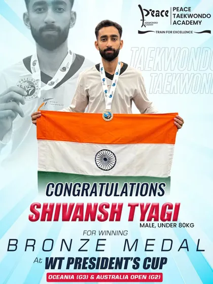 Shivansh Tyagi proudly displays the Indian tricolor after his bronze medal win at the WT President's Cup. His success is a testament to his fighting spirit and the high-performance training at our academy.