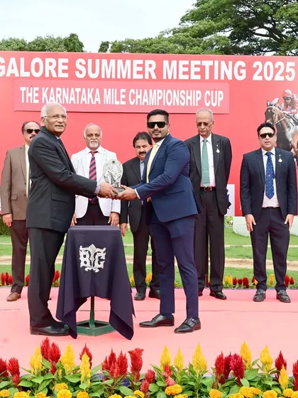 The Karnataka Mile Championship Cup is presented by former Chairman Mr. Harindra Shetty to the winning owner of Mayne Magic.