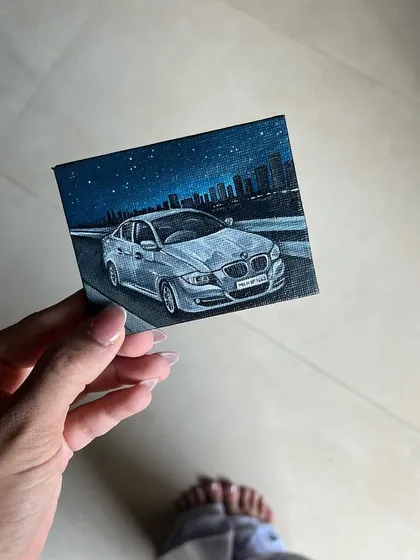 Another shot of the tiny BMW canvas, held in hand to show the scale. These miniature car portraits are a great way to celebrate a car you love.