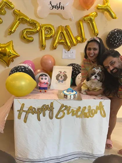 One more family shot because they're just too cute. Celebrating with your dog creates lasting memories for the whole family.