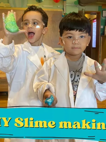 The joy of successful slime! These two are thrilled with their gooey creation. Our science experiments are designed to be fun, safe, and wonderfully messy.