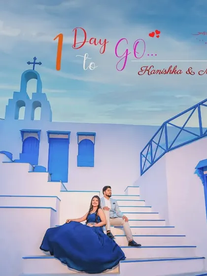 A stunning pre-wedding shoot in a Santorini-themed location, used for a "1 Day to Go" wedding countdown.