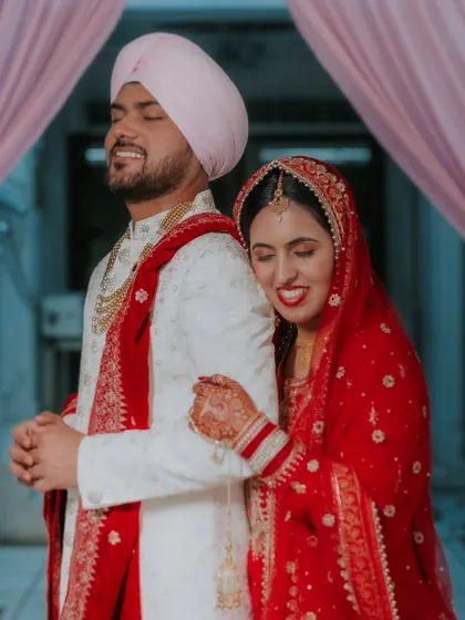 A moment of pure, unscripted joy and affection between the newly married couple.
