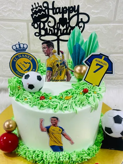 For the sports fan in your life, I can create a cake that celebrates their favorite team or player. This Cristiano Ronaldo themed cake was a huge hit for a young football fan's birthday.