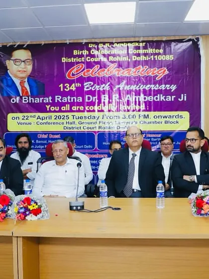 Seated on the dais with principal District and Sessions judges during the Ambedkar Jayanti celebrations.