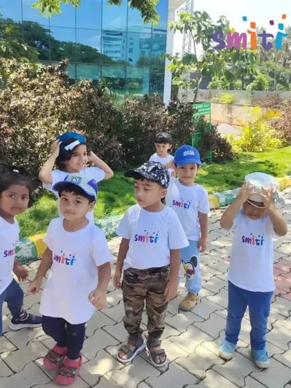 A group of our first-year students on their nature walk, wearing their Smiti t-shirts and hats. They learned about the environment while enjoying the fresh air and sunshine.