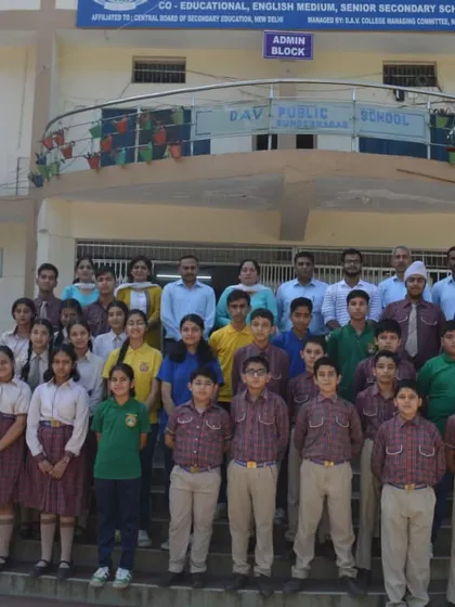 A group photo of students and teachers at DAV Sundar Nagar after a successful workshop on robotics, coding, and AI.