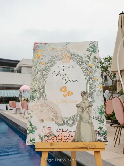 A welcome sign for the 'Fun & Games' themed tea party, featuring vintage illustrations.