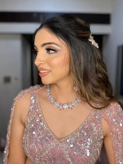 A touch of sparkle for Hetal's sangeet. I added some delicate rhinestones near the eye to elevate her soft pink glam look.