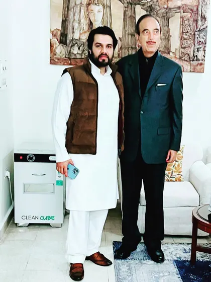 With Mr. Ghulam Nabi Azad. My role as a criminal defense attorney often requires me to engage with prominent public figures.