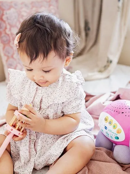 I believe in using a child's own beloved toys as props. It makes the photos more meaningful and captures a true slice of their childhood.