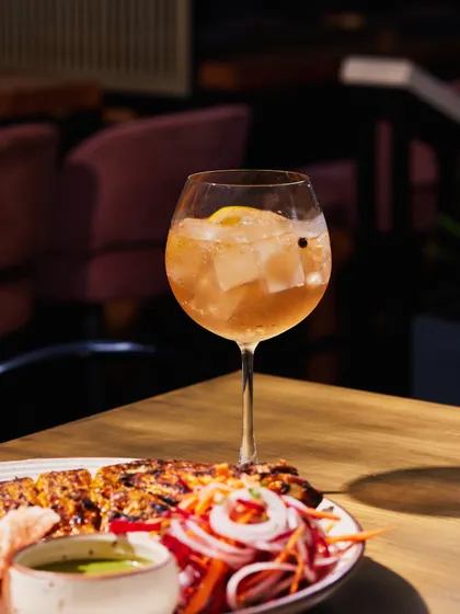 A signature cocktail from our Bangalore pop-up, paired with our delicious grilled chicken.