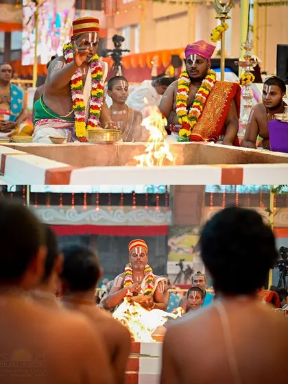 A collage showing the intricate setup for the Maha Sudarshan Homa. The top image shows the priests making offerings, while the bottom image focuses on a priest in deep concentration.