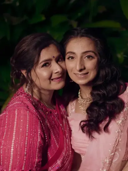 The bride and her mother sharing a sweet moment together.