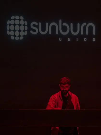 A quiet moment of focus at the console at Sunburn before the crowd rushes in.