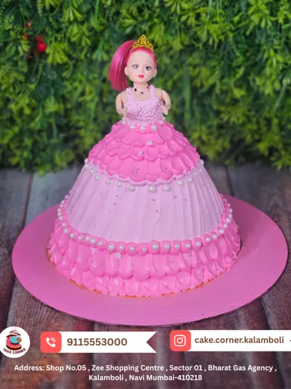 A beautiful pink princess doll cake, where the cake itself forms the gown. Decorated with pearls and ruffles, it's a classic and elegant choice for a birthday girl.
