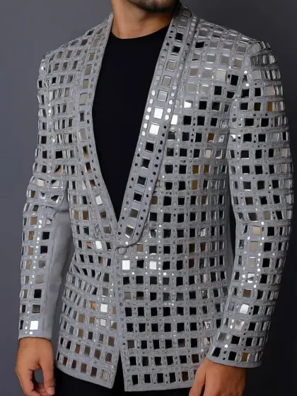 This jacket is all about bold texture and reflection, covered in a precise grid of real mirrors. It's an audacious choice for a cocktail party or sangeet performance.