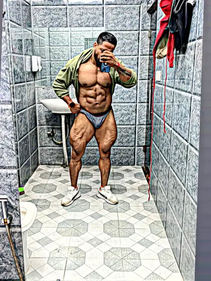 A full-body mirror selfie, showing the complete package.