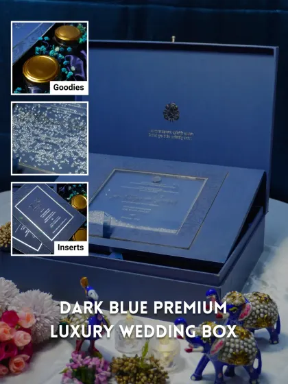 This dark blue premium luxury wedding box is designed for a grand statement. It includes custom inserts for your events and dedicated space for goodies, all wrapped in a sophisticated package.