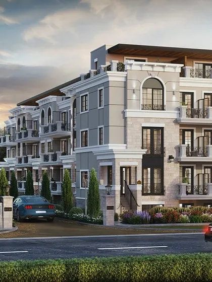 A dusk view of the Canadian townhouse project. The lighting from the windows and streetlights creates a cozy and elegant atmosphere.