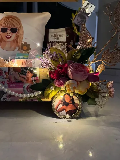 A close up of the Taylor Swift cart wheel, which is also a custom photo frame. I love adding these unique, multi purpose details.