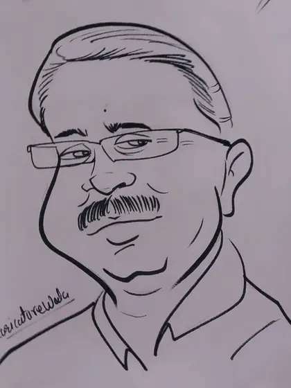 Waiting for his reaction. I think I captured his likeness well in this caricature.
