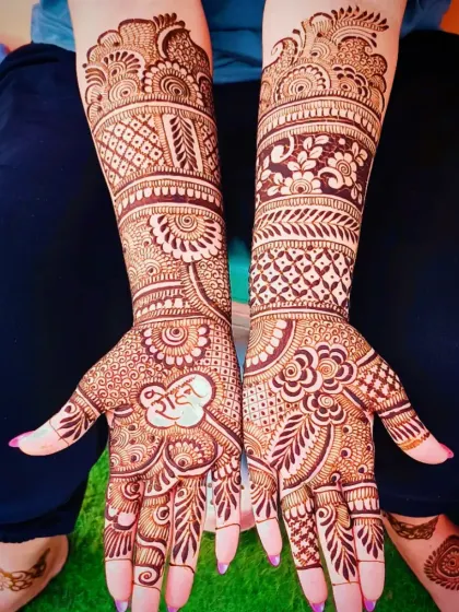 A clear view of the 'Ram' henna design, showcasing the balance between personalized elements and traditional patterns like paisleys and checks.