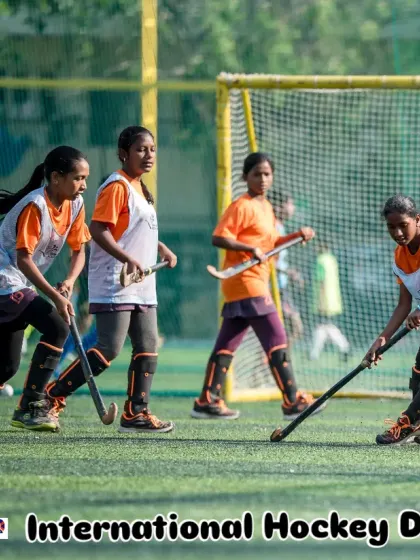 A group of girls engaged in a competitive drill, fighting for possession of the ball. We encourage healthy competition and teamwork, teaching players to work together to achieve a common goal.