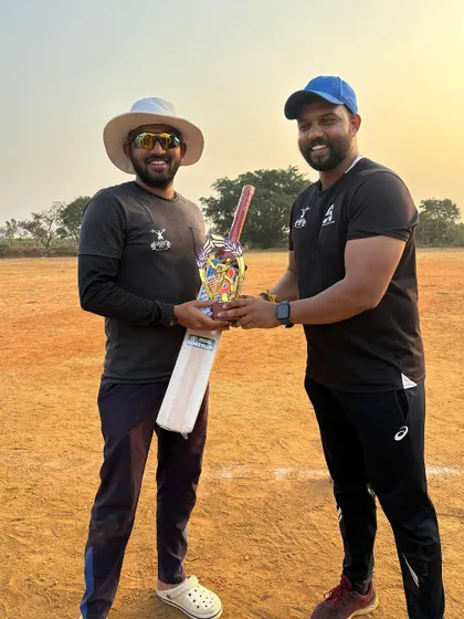 Awarding the trophy for the best batsman of the tournament. We celebrate individual achievements as much as team victories.