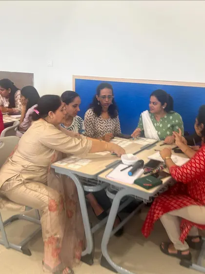 Teachers at DPS Hinjawadi fully immersed in a collaborative task. These activities are designed to model the kind of engaged, hands-on learning we want to create for students.