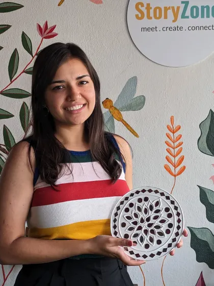 A participant with her elegant, white-on-white Lippan art piece.