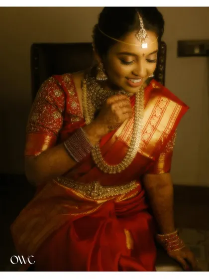 A happy and serene portrait of the bride, her smile gentle and warm.