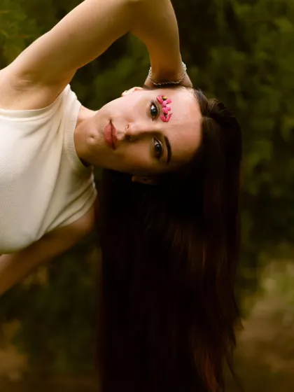 An inverted pose that challenges the viewer's perspective. This kind of experimental shot is perfect for creating unique, attention-grabbing images.