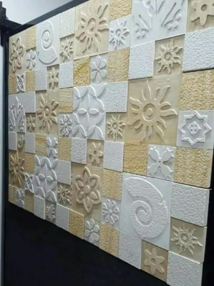 A sample panel showing various designs of 3D decorative wall tiles. We can source and install these to create a custom mosaic-style feature wall with different textures and patterns.