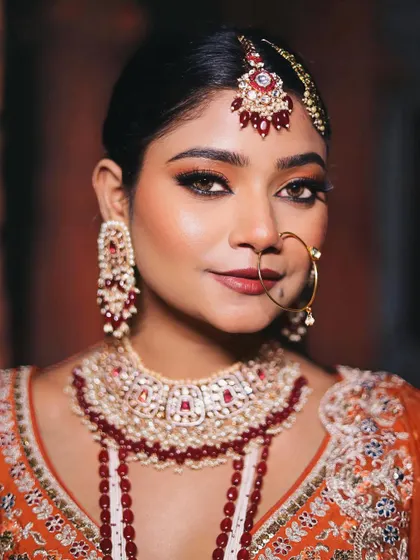 A direct, confident gaze from our Nikkah bride. The makeup is bold and beautiful, perfect for a bride who wants to make a statement.