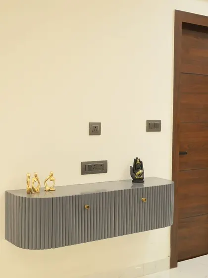 This floating console table is a great way to add storage without taking up floor space. The fluted design and minimal knobs create a modern look that fits perfectly in the entryway.
