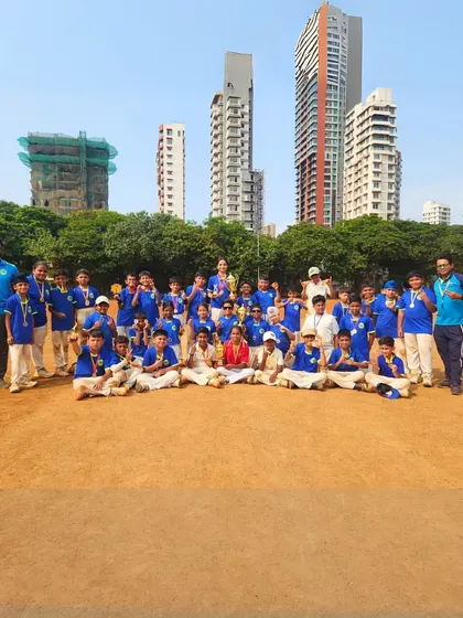 A large group of our champions posing with their medals after a successful tournament. This image captures the scale of our program and the collective success of our athletes.